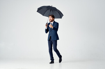 business man in suit umbrella rain protection weather