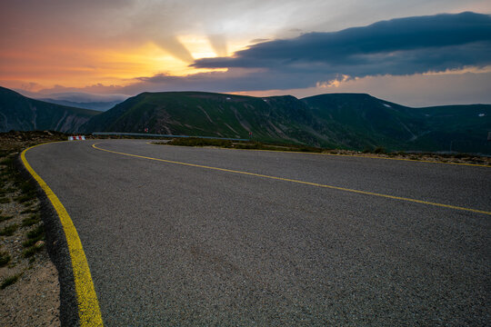 Stormy sunset over the famous national road 67C in Romania called Transalpina