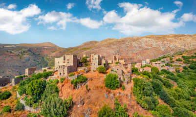 Fototapeta na wymiar View from flying drone of ancient village fortress of the Mani Peninsula - Vathia. Gorgeous summer scene of Peloponnese peninsula, Greece, Europe. Traveling concept background..