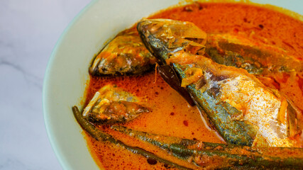 Homemade delicious Mackerel fish curry with lady's fingers.