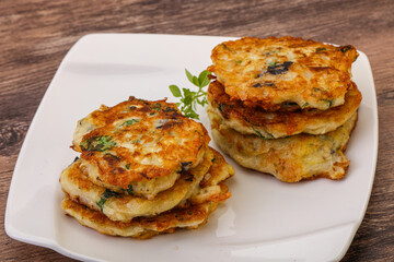 Zucchini pancakes with herbs and spices