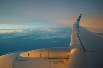 Fototapeta na wymiar Flying on a Plane #plane #sky #wings