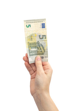Five euro in hand isolated on white background, woman hand with banknote, europe money photo