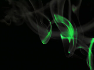 Green Smoke monster face side view created on black background for commercial use.