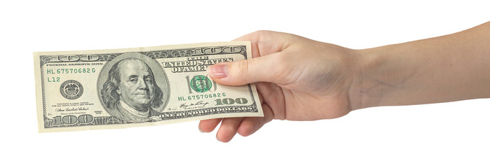 Old 100 dollar bill in hand isolated on white background, woman hand with banknote, american money...
