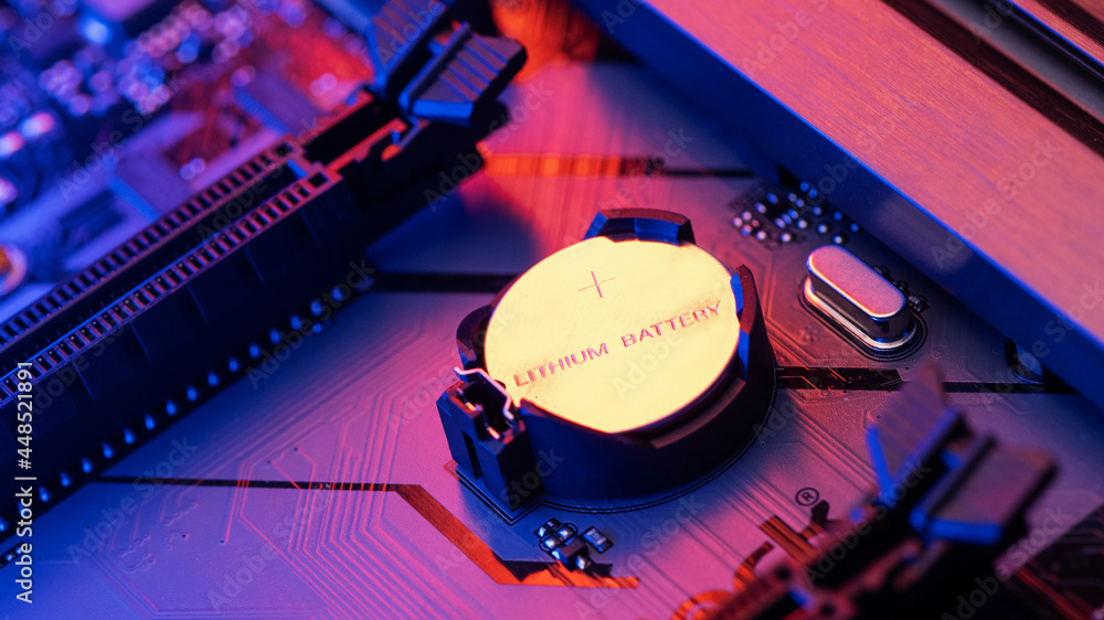 Poster cmos backup battery for powering bios settings and real-time clock circuit on a modern black motherb