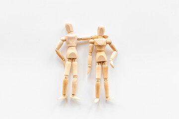 Personal communication concept. Two wooden mannequin figures connection