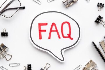 Business concept faq frequently asked questions on office table
