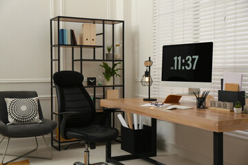 Home office interior with comfortable workplace near window