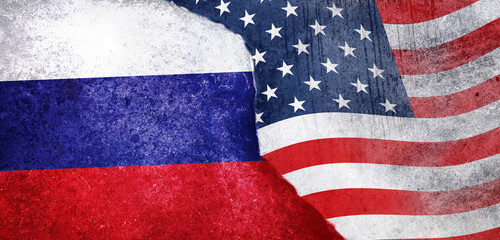 USA vs  Russia conflict concept, Flags of usa or United States of America and Russia on concrete...
