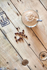 close up of coffee beans with a drink