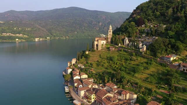 Aerial drone footage of the authentic Morcote vilage by lake Lugano in Canton Ticino in Switzerland