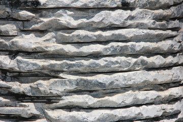 the texture of a gray stone with cracks