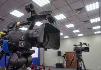 TV camera in the press conference room.