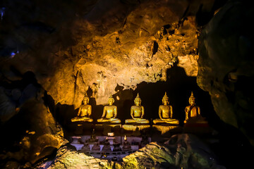 Buddha statue inside a cave in Thailand. Holy.