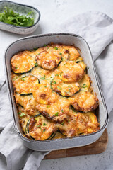 casserole with zucchini squash and cheese in baking dish