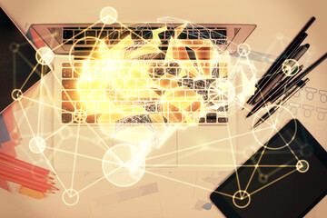Multi exposure of brain sketch hologram over topview work table background with computer. Concept of big data.