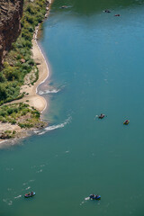View from the Navajo Bridge on tourists rafting on the Colorado River, Arizona, USA