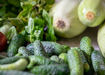 color photo with autumn vegetables on the table, different colors, shapes and types of vegetables prepared for home canning, autumn harvest time