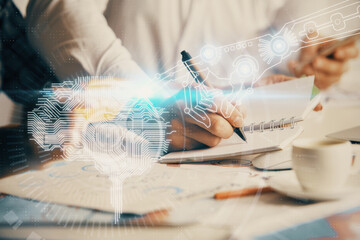 Fototapeta premium Double exposure of brain drawing over people taking notes background. Concept of Ai