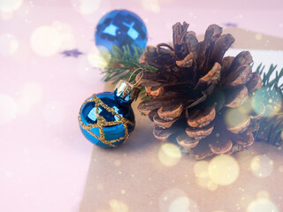 pine cones and a blue Christmas ball. Holiday concept