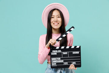 Fascinating charismatic happy pleased smiling young brunette asian woman 20s wears pink clothes...