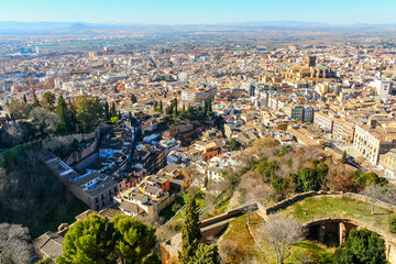 Aerial view of the city of Granada with its cathedral and historic buildings at the foot of the Alhambra.