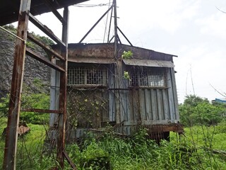 Fototapeta na wymiar abandoned factory and waste steel material