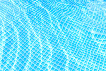 Blue ripple water in the pool on a sunny summer day