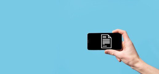 Male hand holding a document icon on blue background. Document Management Data System Business...