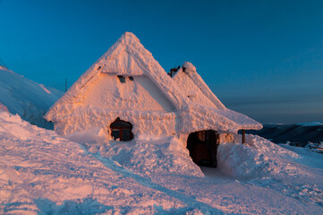 Chatka Puchatka shelter on the top of Polonina Wetlinska in winter, Bieszczady mountains,...