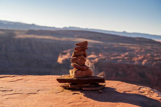 Stacking Stones in Horseshoe Bend at Page, Arizona