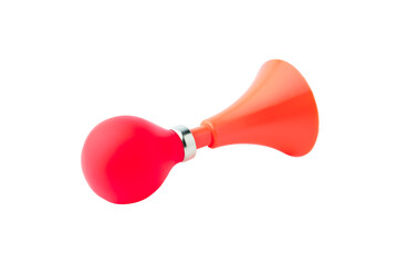 Red plastic bicycle air horn isolated on white background