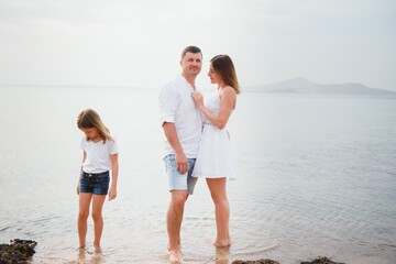 Cute happy family having fun on luxury tropical resort, summer holidays, love concept