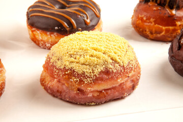 Gourmet hand made doughnuts in blueberry custard filled flavour