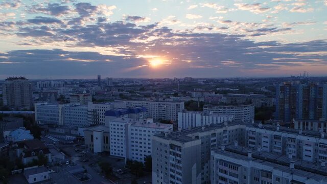  Aerial Shot Of Russian City At Sunrise Birds Fly Around