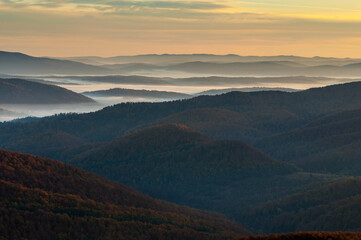 Sunrise seen from the summit of Połonina Wetlińska towards the Bieszczady peaks and the summit of Połonina Caryńska, the Bieszczady forest, the Bieszczady mountains, the Carpathians