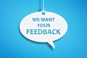 We Want Your Feedback written in speech bubble on blue background