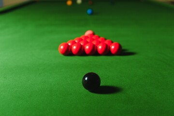 snooker balls set on a green table
