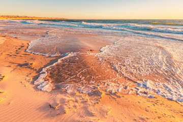 Waves washing Blanche Point coastline at sunset during the winter season, Fleurieu Peninsula, South Australia