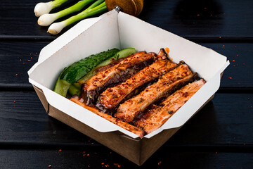 BBQ Pork Ribs in Takeaway Box Delivery concept