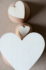 plain hearts on wooden objects - shallow depth of field