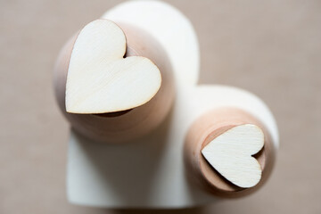 plain hearts on wooden objects - shallow depth of field