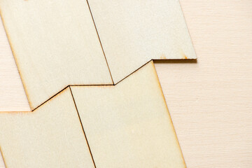Fototapeta premium wooden tags arranged on a light wood background