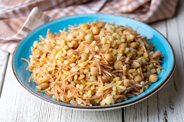 Traditional delicious Turkish food; bulgur pilaf with chickpea (Turkish name; nohutlu bulgur pilavi)