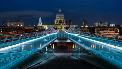 St Paul's Cathedral is an Anglican cathedral in London view from Millenium Bridge at Blue Hour