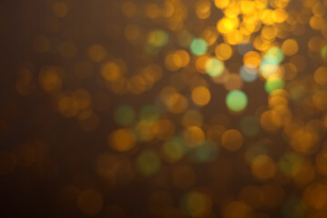 Fototapeta premium Blurred view of shiny lights on dark background. Bokeh effect