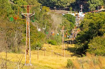 chair lift going up the mountain, in Serra Negra, State of São Paulo, Brazil - July 26, 2021