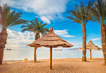 Morning on sandy beach in Eilat - famous tourist resort and recreation city in Israel