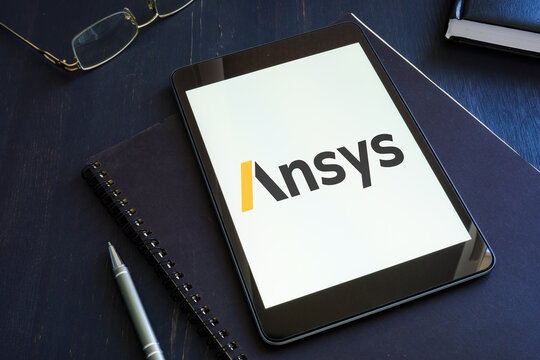 KYIV, UKRAINE - June 30, 2021. Ansys engineering simulation logo on the smartphone and notepad.